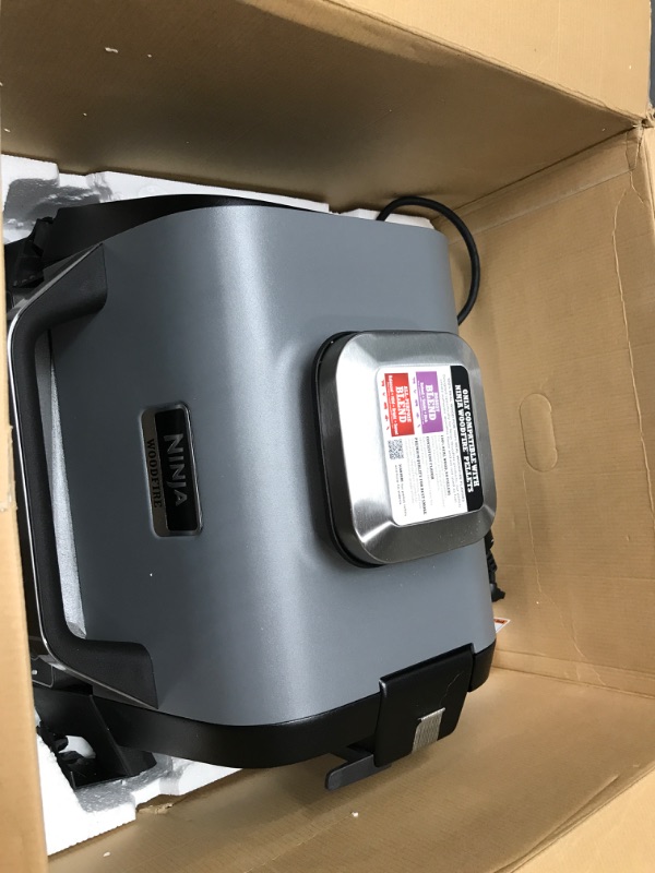 Photo 1 of **FOR PARTS, POSSIBLY REPAIRABLE, PLASTIC SHATTERED** Ninja OG701 Woodfire Outdoor Grill & Smoker, 7-in-1, Portable, Electric, Grey
