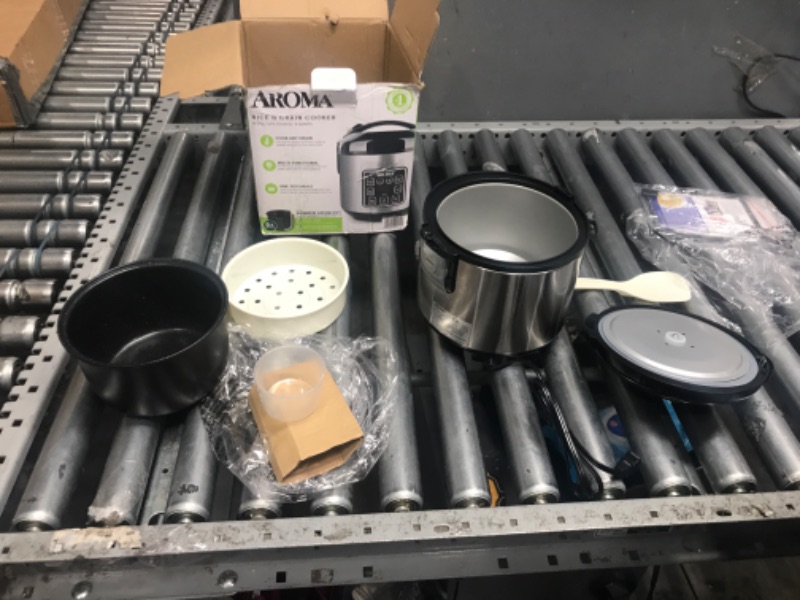 Photo 2 of **DAMAGED**
***PARTS ONLY***
Aroma Housewares ARC-914SBD Digital Cool-Touch Rice Grain Cooker and Food Steamer, Stainless, Silver, 4-Cup (Uncooked) / 8-Cup (Cooked) Basic