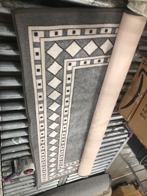 Photo 1 of 5ft x 8ft grey area rug 