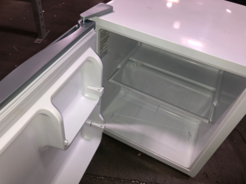 Photo 2 of *SLIGHTLY TURNS COLD* BLACK+DECKER BCRK17W Compact Refrigerator Energy Star Single Door Mini Fridge with Freezer, 1.7 Cubic Ft., White White Mini Fridge