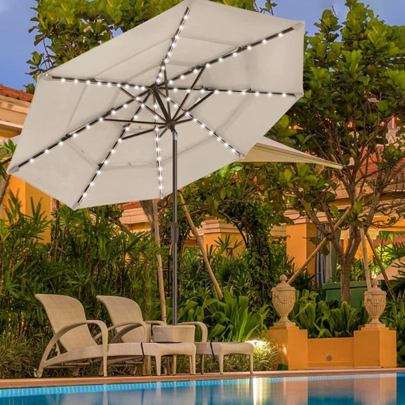 Photo 1 of *IMAGE IS JUST FOR REFERENCE* EliteShade USA 10-Year-Non-Fading Sunumbrella Solar 9ft 3 Tiers Market Umbrella with 80 LED Lights Patio Umbrellas Outdoor Table with Ventilation,Antique Beige
