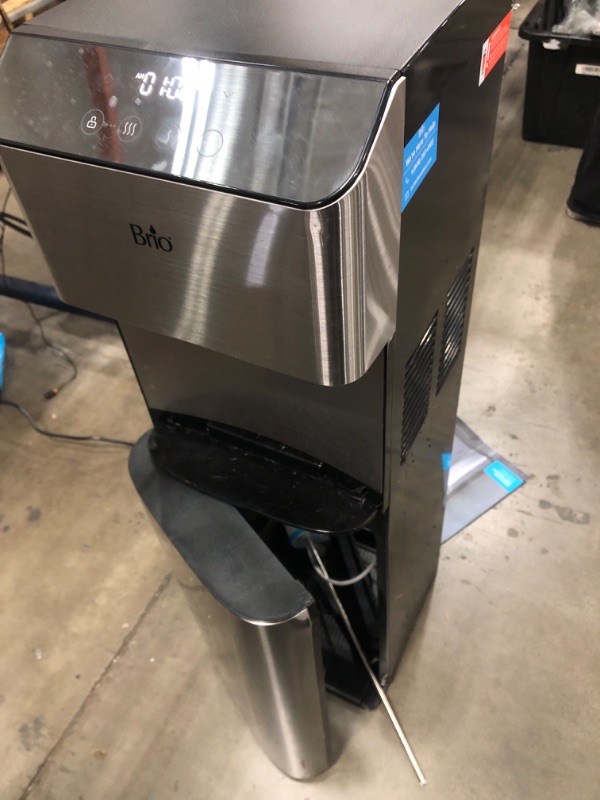 Photo 1 of **FOR PARTSW ONLY**
Brio Moderna Bottom Load Water Cooler Dispenser - Tri-Temp, Adjustable Temperature, Self-Cleaning, Touch Dispense, Child Safety Lock, Holds 3 or 5 Gallon Bottles, Digital Display and LED Light Stainless Steel Moderna