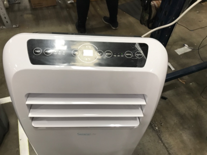 Photo 1 of SereneLife SLPAC12.5 SLPAC 3-in-1 Portable Air Conditioner with Built-in Dehumidifier Function,Fan Mode, Remote Control, Complete Window Mount Exhaust Kit, 12,000 BTU, White
