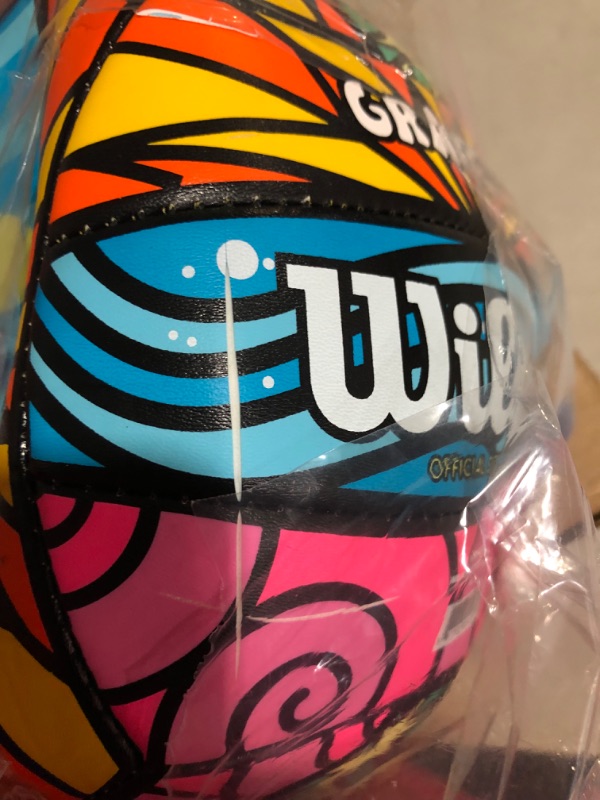 Photo 3 of **MINOR SLASH ON BALL, IT DOES NOT CAUSE IT TO LEAK AIR
FLAT-WILSON Outdoor Recreational Volleyball - Official Size Graffiti Blue/Yellow/Orange/Pink