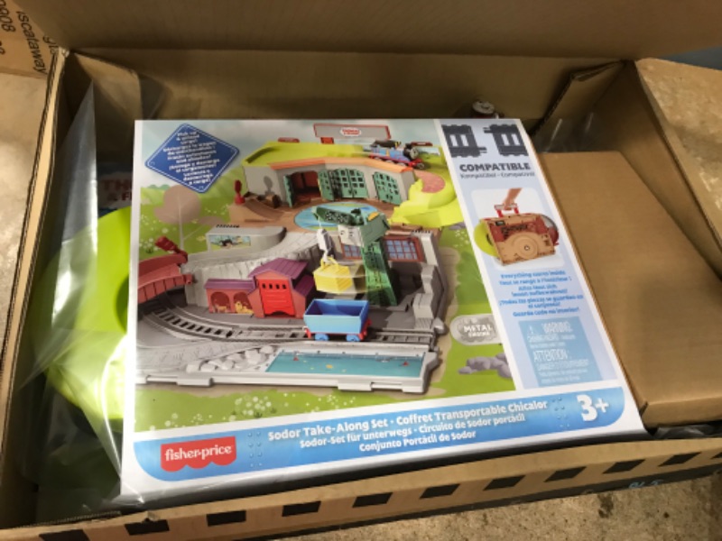 Photo 1 of * item used * item missing pieces *
Thomas & Friends Sodor Take-Along Train Set for Kids with Diecast Push-Along Thomas Engine