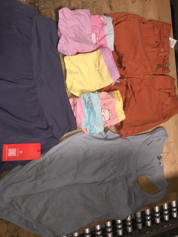 Photo 1 of bundle of assorted clothes l, xl  *baby size in pictures*