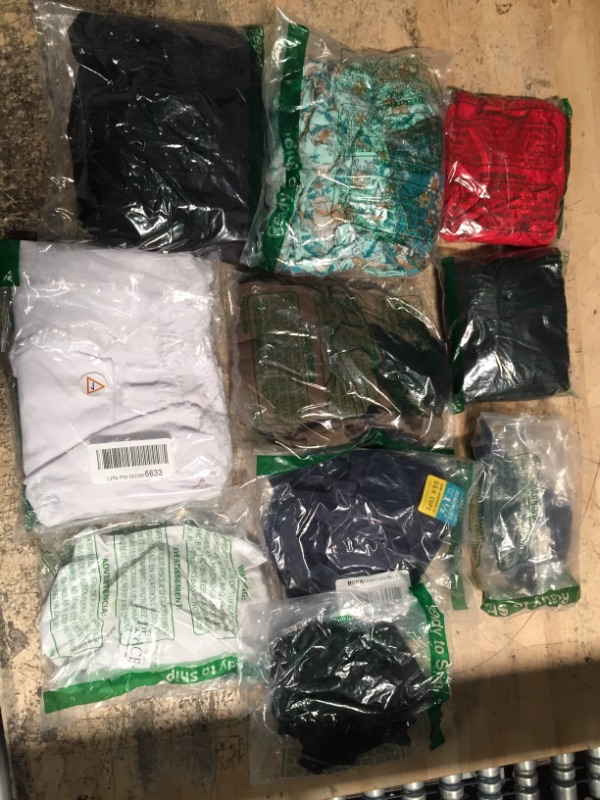 Photo 1 of 10 piece bundle of assorted clothing