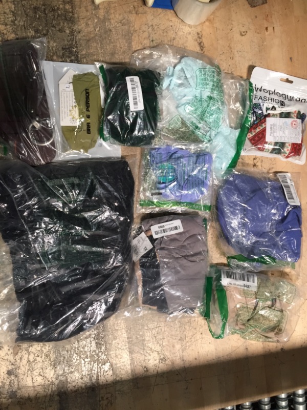 Photo 1 of 10 piece bundle of assorted clothing and various items