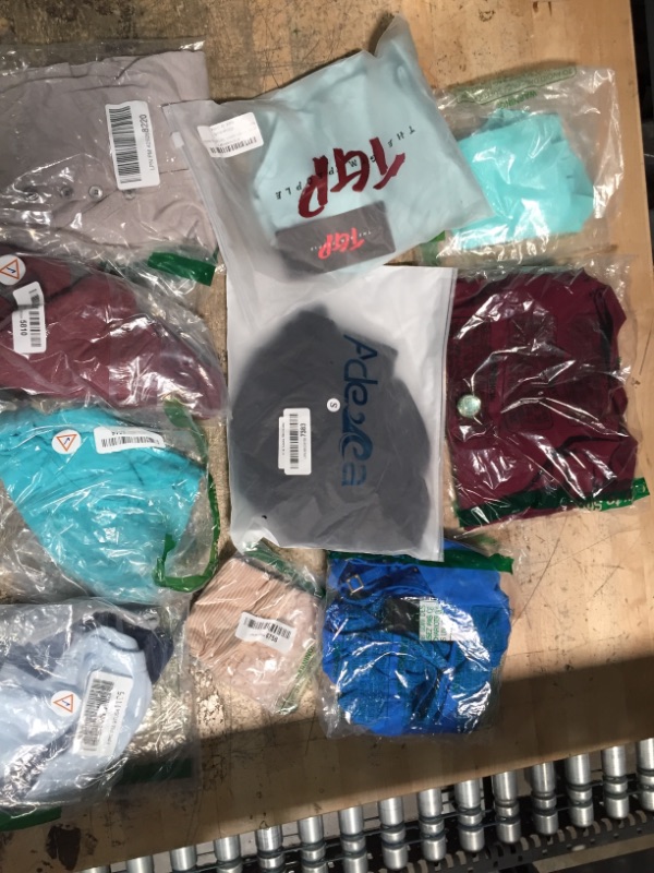 Photo 1 of 10 piece bundle of assorted clothing 
