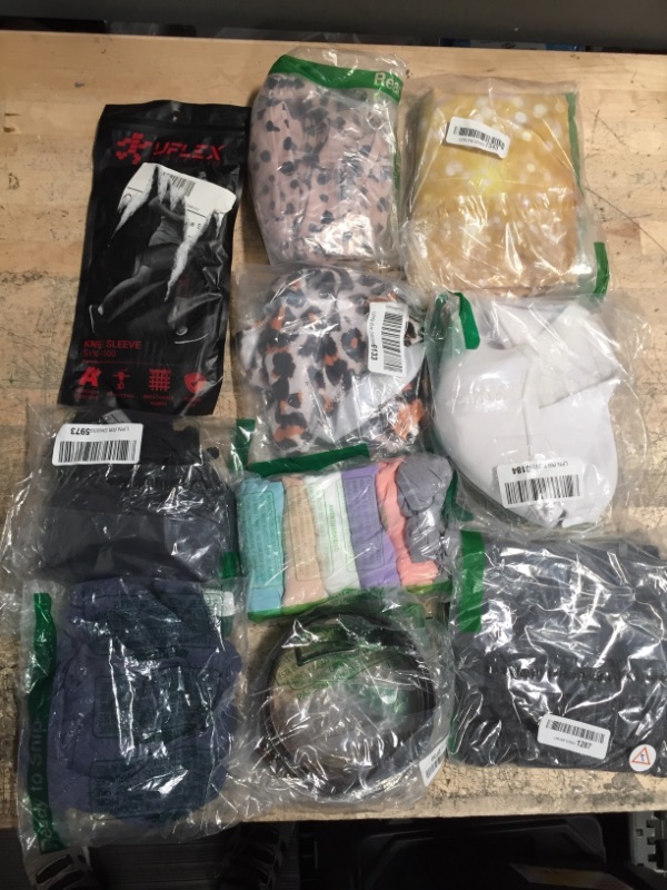 Photo 1 of 10 piece bundle of assorted clothing and various items