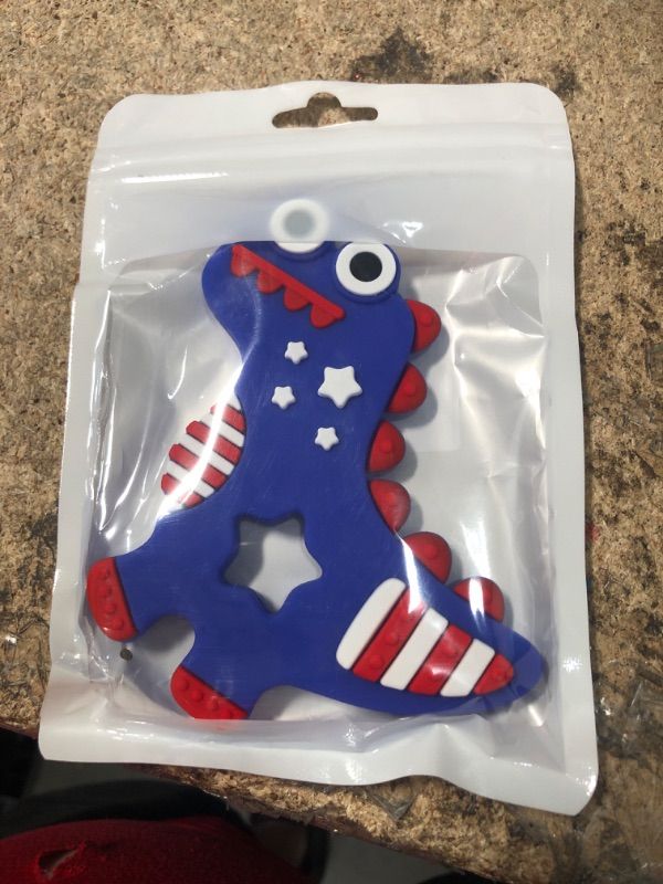 Photo 1 of 4th of July Silicone Baby Teething Toys for Babies 6-12 Months, Red White & Blue Dinosaur Baby Teether Toy Teething Pain Relief Baby Chew Toy 3 Months, Infant Toys for Boys Girls 4th of July Gifts