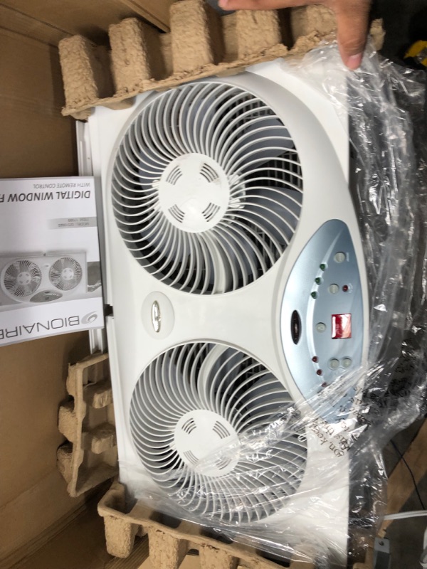 Photo 2 of **NON-FUNCTIONAL*** Bionaire Window Fan with Twin 8.5-Inch Reversible Airflow Blades and Remote Control, White White 2 Blades Electronic control with LCD screen Window Fan