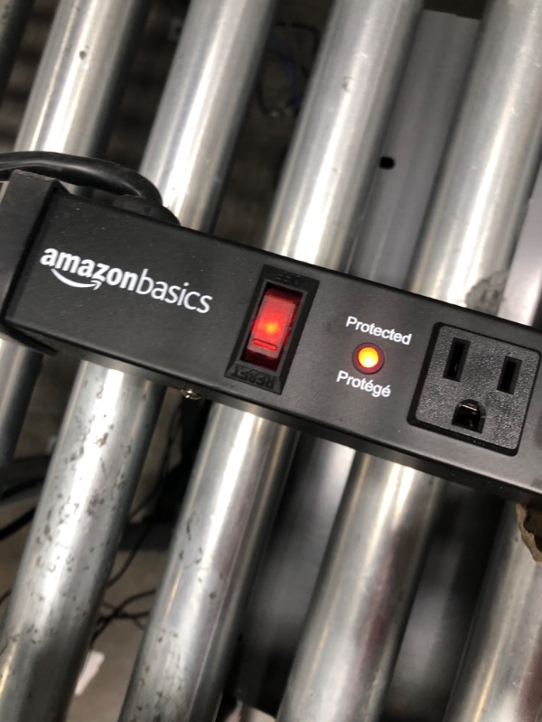 Photo 3 of ***POWERS ON*** Amazon Basics Heavy Duty Metal Surge Protector Power Strip with Mounting Brackets - 12-Outlet, 600-Joule (15A On/Off Circuit Breaker) 12 Outlet Power Strip