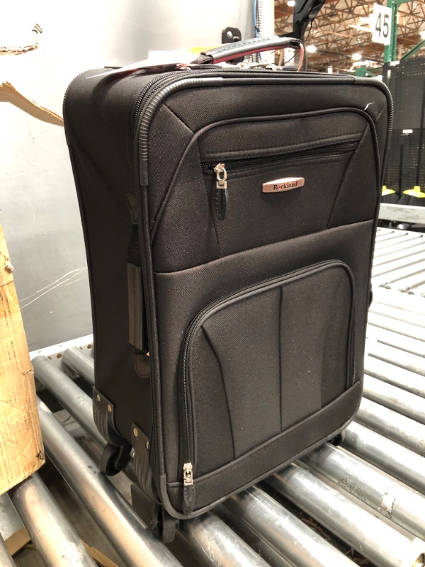 Photo 2 of **MINOR WEAR & TEAR**Rockland Expandable Spinner Carry On, Black, 19-Inch Carry-On 19-Inch Black