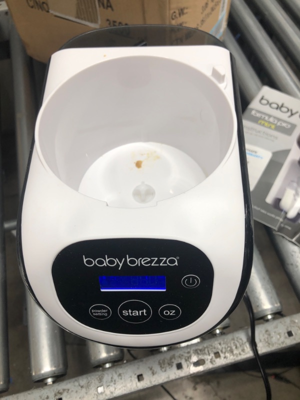 Photo 2 of Baby Brezza Formula Pro Mini Baby Formula Maker – Small Baby Formula Mixer Machine Fits Small Spaces and is Portable for Travel– Bottle Makers Makes The Perfect Bottle for Your Infant On The Go Formula Pro Mini Dispenser Machine