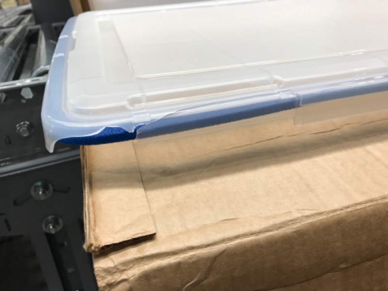 Photo 5 of **DAMAGED**
IRIS USA 70 Quart WEATHERPRO Plastic Storage Box with Durable Lid and Seal and Secure Latching Buckles, Clear With Blue Buckles, Weathertight, 3 Pack 70 Quart - 3 Pack
**MISSING LID**