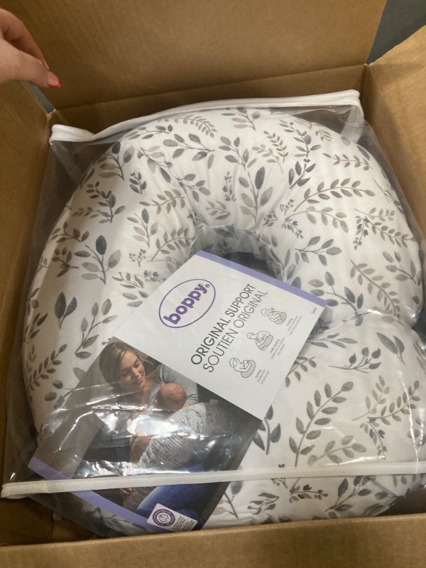 Photo 1 of Boppy Original Support Nursing Pillow, Gray Taupe Leaves, Ergonomic Breastfeeding, Bottle Feeding, and Bonding, Firm Hypoallergenic Fiber Fill, Removable Cover, Machine Washable