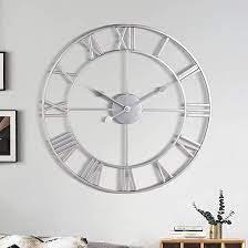 Photo 1 of 1st owned Large Wall Clock, Metal Retro Roman Numeral Clock, Modern Round Wall Clocks Almost Silent, Easy to Read for Living Room/Home/Kitchen/Bedroom/Office/School Decor (Silver, 24 Inch)
