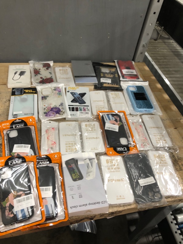 Photo 1 of Bundle of assorted phone cases/ electronic accessories 