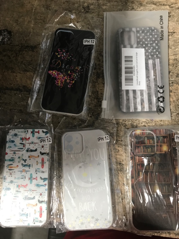 Photo 1 of bundle of 5 Iphone cases