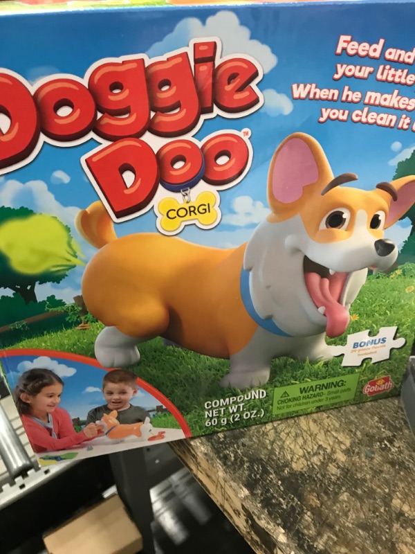 Photo 2 of Doggie Doo Corgi Game - Unpredictable Action - Feed The Doggie and Collect His Doo to Win - Includes 24-Piece Puzzle by Goliath