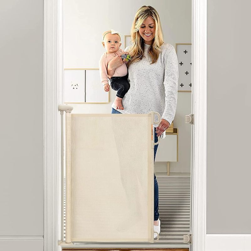 Photo 1 of Momcozy Retractable Baby Gate, 33" Tall, Extends up to 55" Wide, Child Safety Baby Gates for Stairs, Doorways, Hallways, Indoor, Outdoor