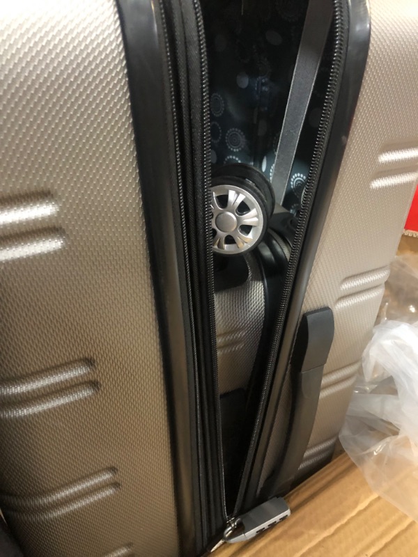 Photo 4 of ***DAMAGED - SEE NOTES***
Rockland Melbourne Hardside Expandable Spinner Wheel Luggage, Silver, 2-Piece Set (20/28)