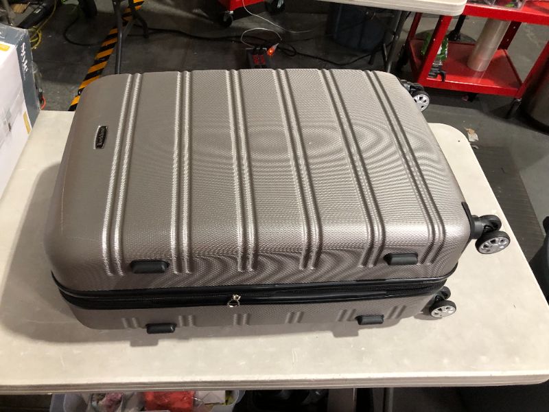 Photo 9 of ***DAMAGED - SEE NOTES***
Rockland Melbourne Hardside Expandable Spinner Wheel Luggage, Silver, 2-Piece Set (20/28)