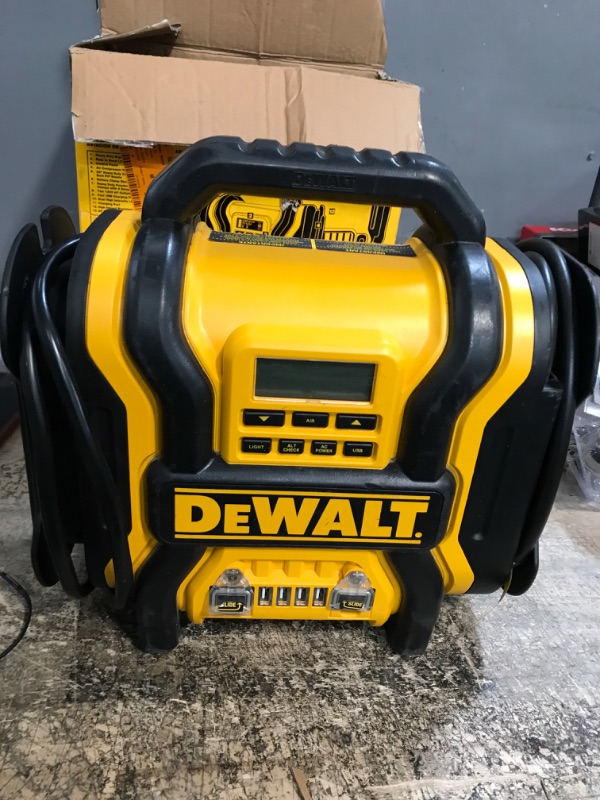 Photo 2 of DEWALT DXAEPS14 1600 Peak Battery Amp 12V Automotive Jump Starter/Power Station with 500 Watt AC Power Inverter, 120 PSI Digital Compressor, and USB Power , Yellow