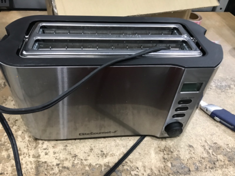 Photo 2 of ***POWERS ON***Elite Gourmet ECT4400B# Long Slot 4 Slice Toaster, Countdown Timer, Bagel Function, 6 Toast Setting, Defrost, Cancel Function, Built-in Warming Rack, Extra Wide Slots for Bagel Waffle, Stainless Steel 4 Slice Stainless Steel