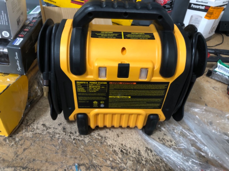 Photo 2 of **MISSING CHARGER**
DEWALT DXAEPS14 1600 Peak Battery Amp 12V Automotive Jump Starter/Power Station with 500 Watt AC Power Inverter Yellow