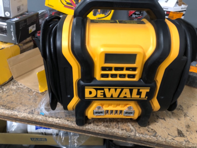 Photo 3 of DEWALT DXAEPS14 1600 Peak Battery Amp 12V Automotive Jump Starter/Power Station with 500 Watt AC Power Inverter, 120 PSI Digital Compressor, and USB Power , Yellow