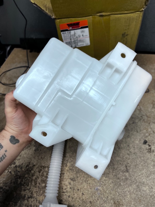 Photo 1 of Dorman 603-032 Front Washer Fluid Reservoir Compatible with Select Ford/Lincoln/Mercury Models