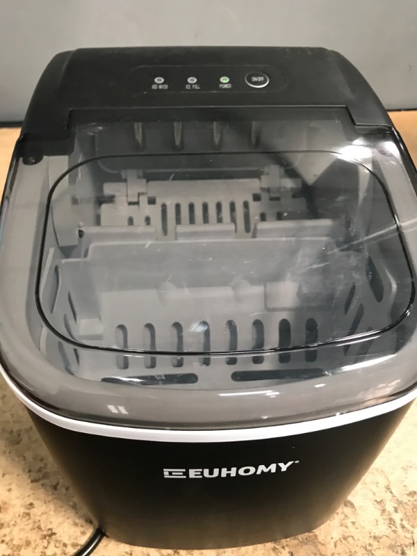 Photo 1 of ***POWERS ON*** EUHOMY Ice Maker Machine Countertop, 26 lbs in 24 Hours, 9 Cubes Ready in 6 Mins, Self-Clean Electric Ice Maker Compact Potable Ice Maker with Ice Scoop and Basket. for Home/Kitchen/Office.(Black)
