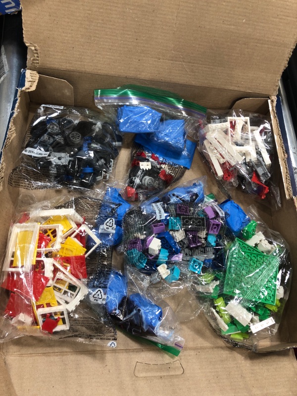 Photo 1 of Box of mixed legos.