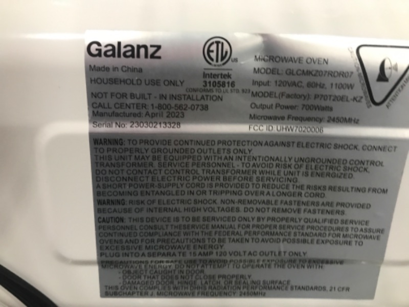 Photo 4 of ***TESTED/ POWERS ON***Galanz GLCMKZ07RDR07 Retro Countertop Microwave Oven with Auto Cook & Reheat, Defrost, Quick Start Functions, Easy Clean with Glass Turntable, Pull Handle.7 cu ft, Red
