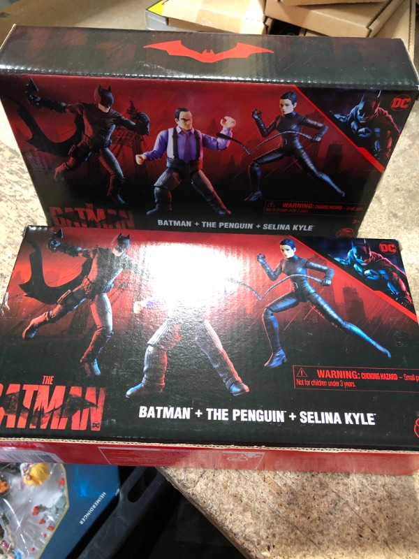 Photo 2 of 2pcks of DC Comics, Batman 3-Pack with Exclusive 4” Batman, Selina Kyle, The Penguin Action Figures, 3 Accessories, Batman Movie Kids Toys (Amazon Exclusive) Figures 3-pack