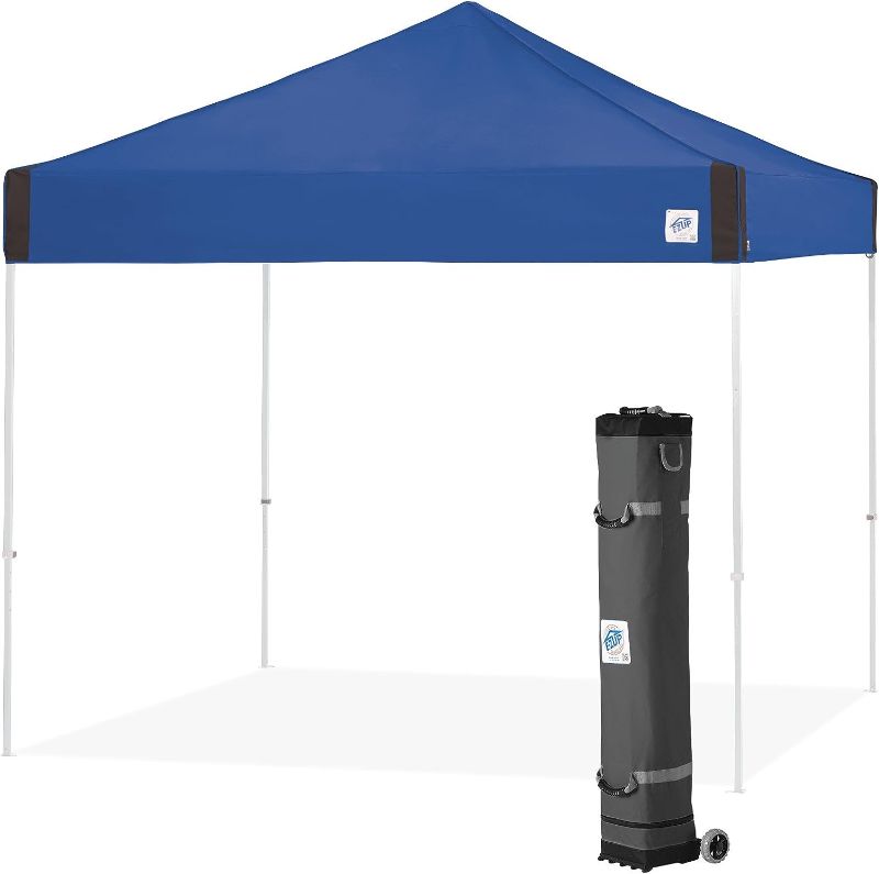Photo 1 of  USED. E-Z UP Pyramid Instant Shelter Canopy, 10' x 10' with Wide-Trax Roller Bag & 4 Piece Spike Set, Royal Blue
