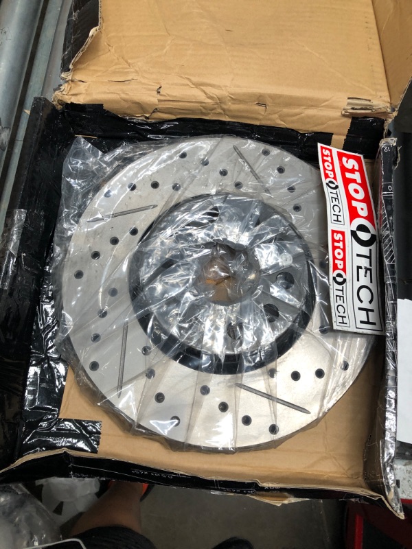 Photo 2 of StopTech 127.33098L Sport Front Left Drilled/Slotted Disc Brake Rotor - Fits Select Audi and Volkswagen Vehicles