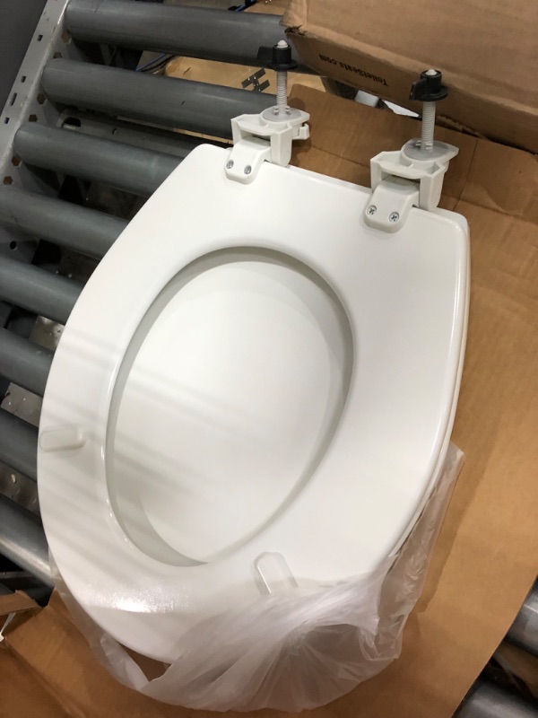 Photo 1 of BEMIS Lift-Off Round Closed Front Toilet Seat in White