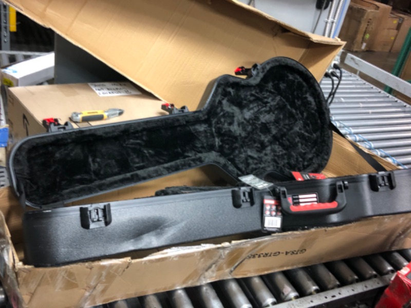 Photo 4 of **NECK OF CASE IS DENTED, SEE PHOTO**
Gator Cases Molded Flight Case for 335 Semi-Hollow Electric Guitars with TSA Approved Locking Latch; (GTSA-GTR335) 335 Semi-Hollow Flight Case