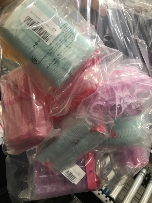 Photo 1 of 10 bags of rollers