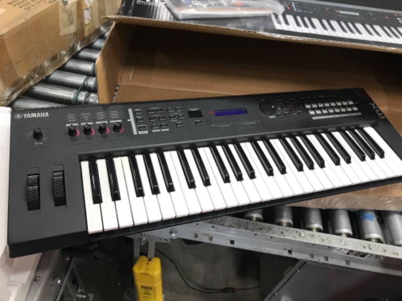 Photo 1 of ***SCUFFED AND DIRTY - SEE PICTURES - POWERS ON***
Yamaha MX49 Music Production Synthesizer, Black Black 49-Key MX