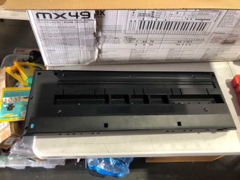 Photo 1 of ***SCUFFED AND DIRTY - SEE PICTURES - POWERS ON***
Yamaha MX49 Music Production Synthesizer, Black Black 49-Key MX