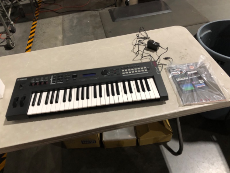 Photo 1 of ***SCUFFED AND DIRTY - SEE PICTURES - POWERS ON***
Yamaha MX49 Music Production Synthesizer, Black Black 49-Key MX
