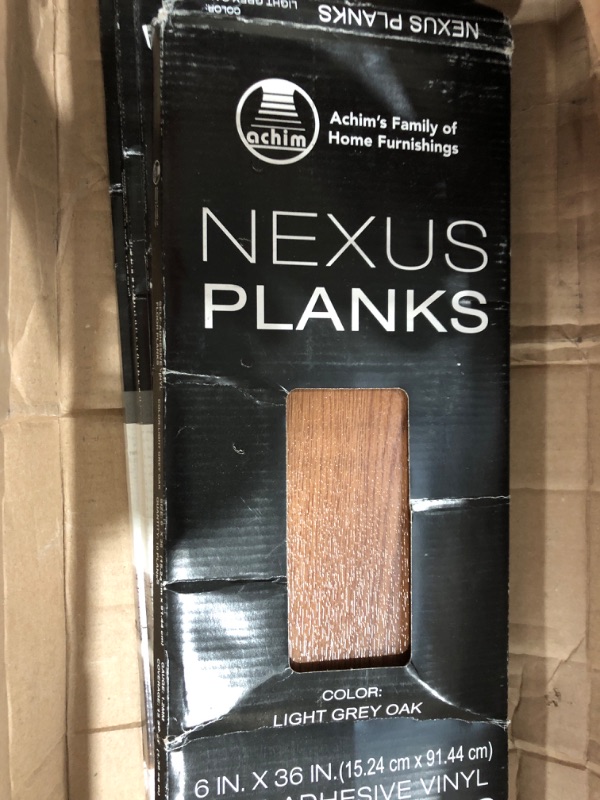 Photo 2 of ***USED FAIRLY NEW*** OPEN BOX***
Vinyl Peel and Stick Floor Tile, Self-Adhesive Wood Plank, 10-Pack (15 Square Feet) - 6 Inch Width, 36 Inch Length, 1.2mm - Light Grey Oak - Easy DIY Nexus Planks for Any Room by Achim Home Decor 10 Planks Oak