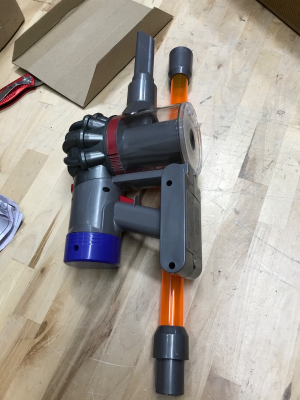 Photo 2 of Casdon 68702 Dyson Cordless Vacuum Interactive Toy for Children Aged 3+, Purple and Orange