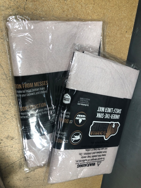 Photo 2 of **SET OF 2** Gorilla Grip Quick Dry Waterproof Under Sink Mat Liner, 24x36, Slip Resistant, Non-Adhesive, Absorbent Mats for Below Sinks, Durable Shelf Liners to Protect Cabinets, Machine Washable, Pink 24" x 36" Pink