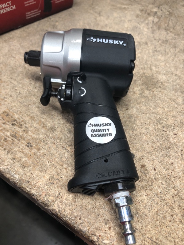 Photo 2 of HUSKY H4435 1/2" Compact Impact Wrench Air Tool, Black