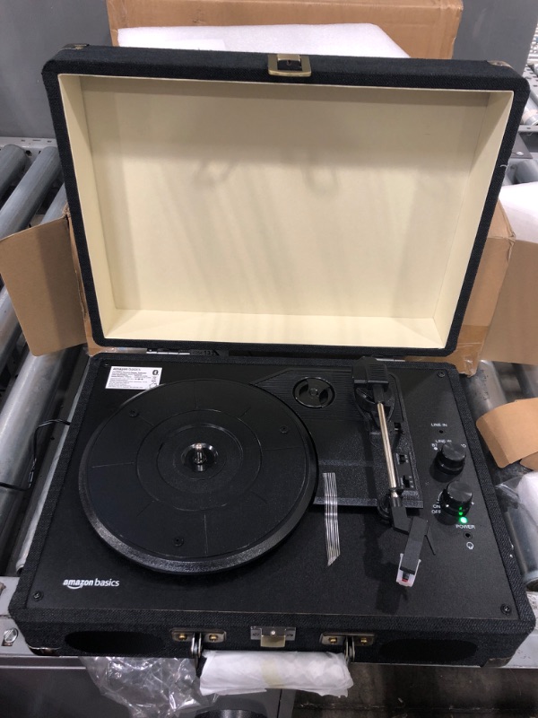 Photo 2 of Amazon Basics Turntable Record Player with Built-in Speakers and Bluetooth, Suitcase, Black Suitcase - Black